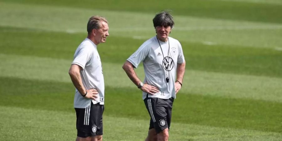 Joachim Löw und Andreas Köpke arbeiteten 17 Jahre für den Deutschen Fussball-Bund. Foto: Christian Charisius/dpa