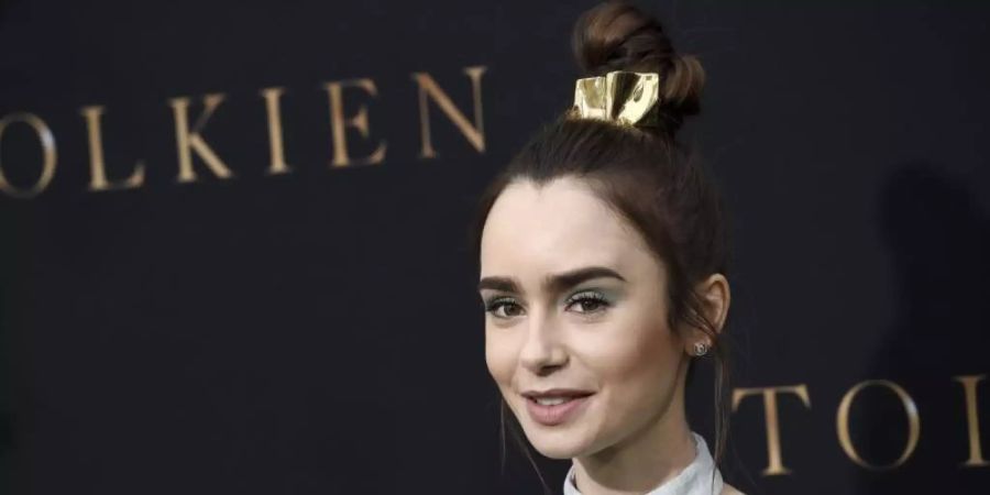 Lily Collins wird 32. Foto: Chris Pizzello/Invision/AP/dpa
