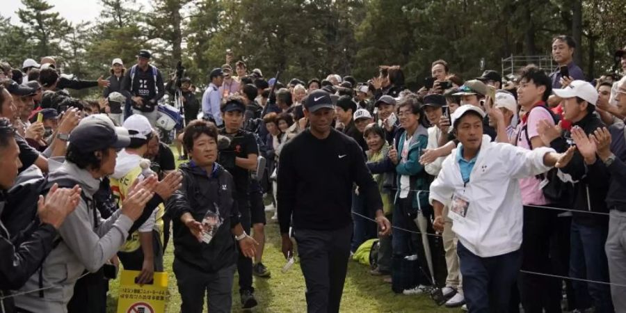 Ist auch in Japan ein Star: Tiger Woods. Foto: Lee Jin-Man/AP/dpa