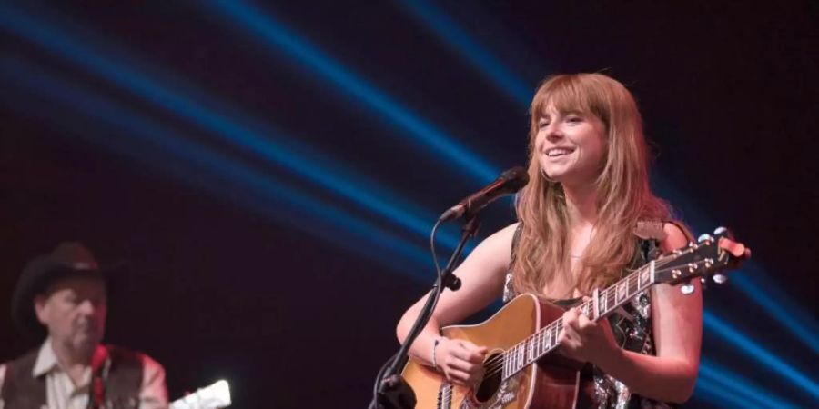 Rose-Lynn (Jessie Buckley) ist eine talentierte Country-Sängerin. Foto: -/ eOne Germany/dpa