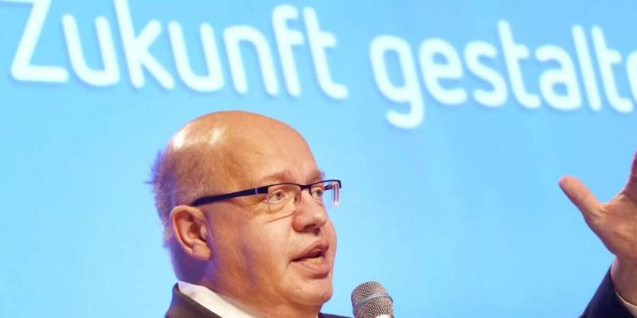 Peter Altmaier (CDU), Bundeswirtschaftsminister, spricht auf dem Deutschen Arbeitgebertag 2019 unter dem Schriftzug "Zukunft gestalten". Foto: Wolfgang Kumm/dpa