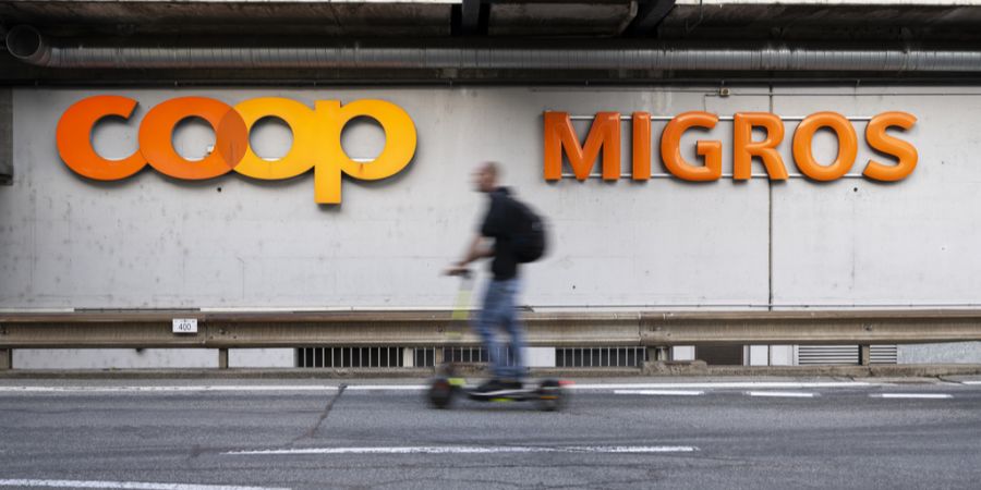 Coop Migros Logos Rollerfahrer