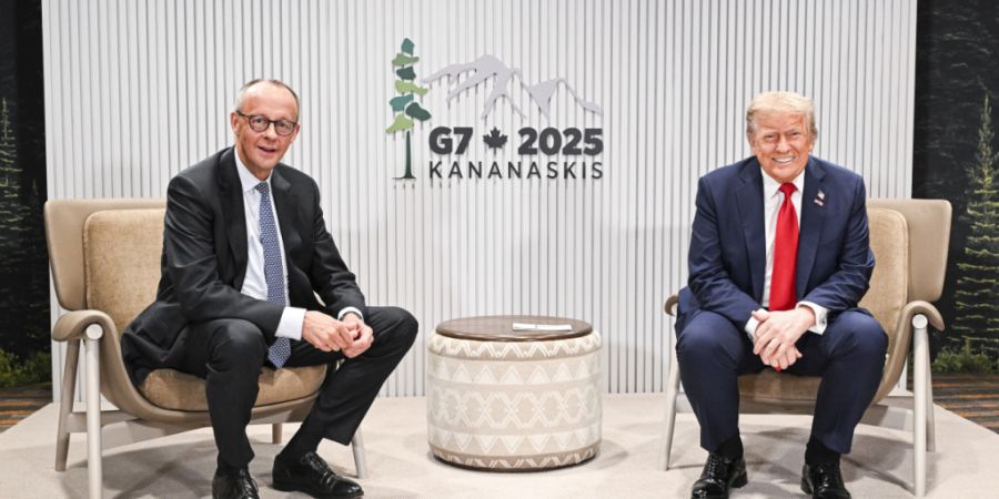 HANDOUT - Der deutsche Bundeskanzler Friedrich Merz und US-Präsident Donald Trump beim G7-Gipfel in Kanada (Archivbild). Foto: Guido Bergmann/Bundesregierung/dpa - ACHTUNG: Nur zur red...