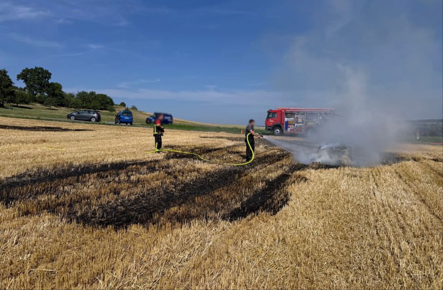 Quaderballenpresse in Brand