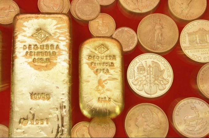 Verunsicherung lässt den Goldpreis steigen. (Symbolbild) Gold Goldpreis Goldmünzen Goldbarren