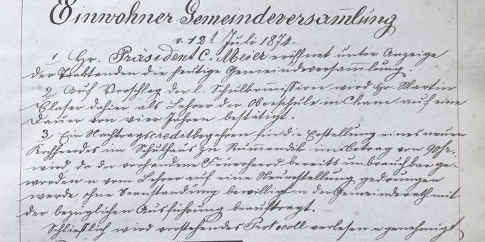 Das Protokoll der ersten Chamer «Einwohner-Gemeindeversammlung» vom 12. Juli 1874. Historisches Dokument.